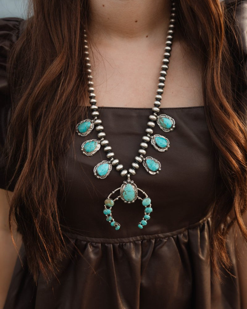 Two Stories Wide Turquoise Squash Blossom - Horseshoe J & Co.