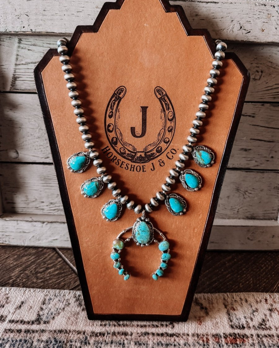 Two Stories Wide Turquoise Squash Blossom - Horseshoe J & Co.