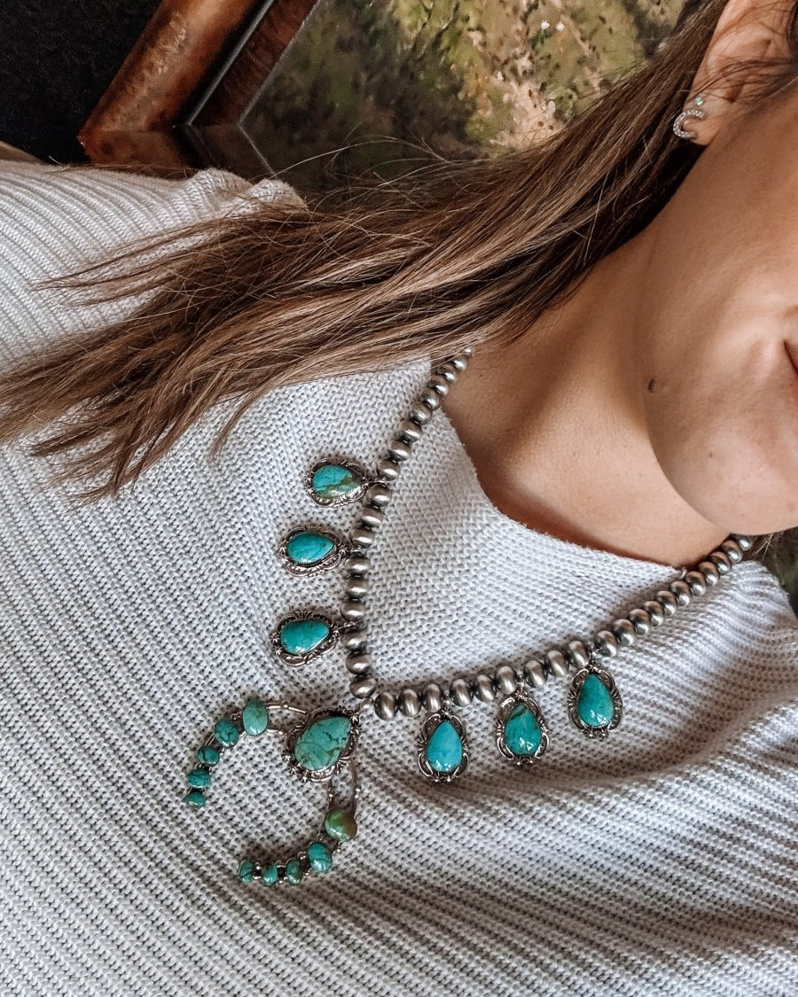 Two Stories Wide Turquoise Squash Blossom - Horseshoe J & Co.