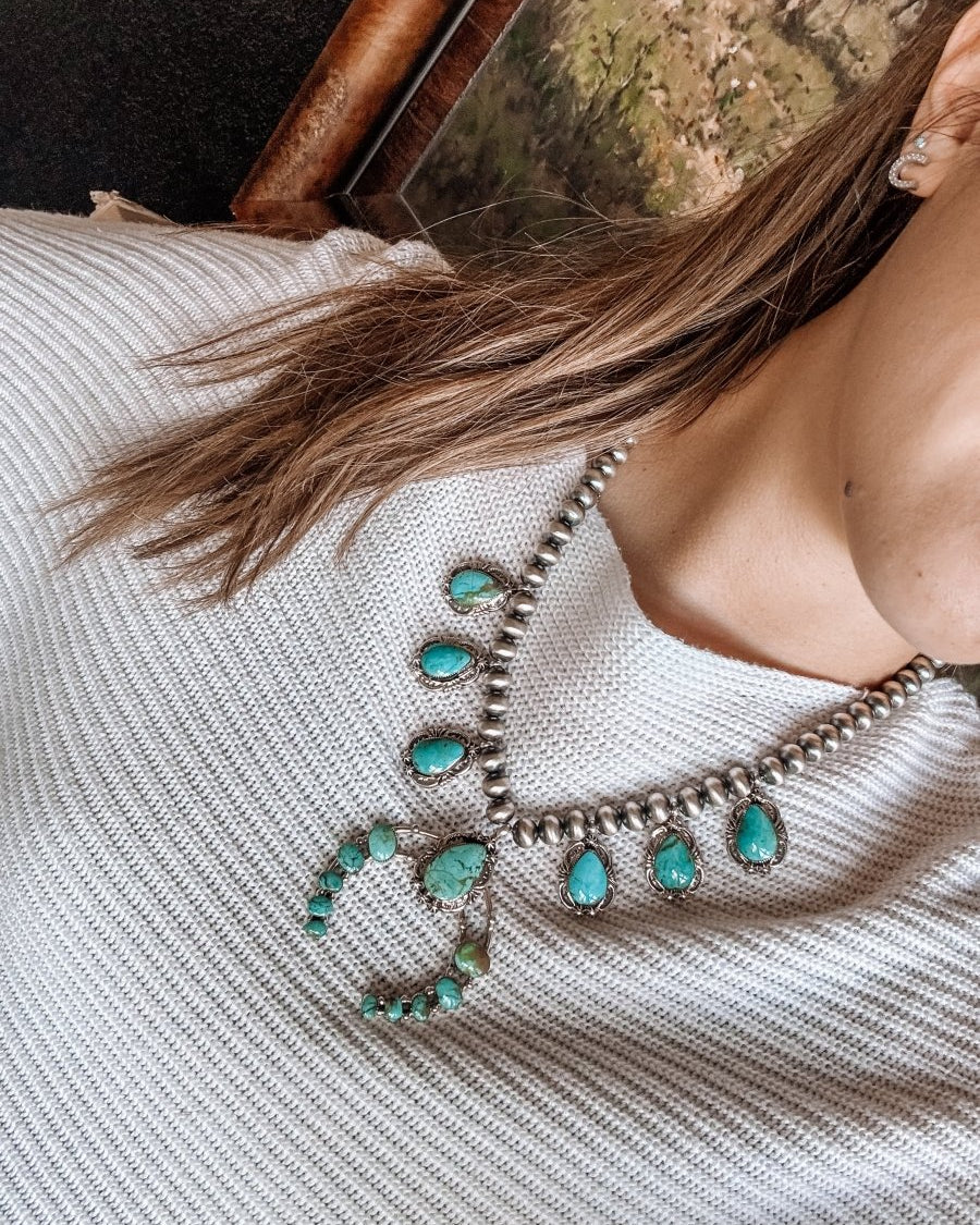 Two Stories Wide Turquoise Squash Blossom - Horseshoe J & Co.