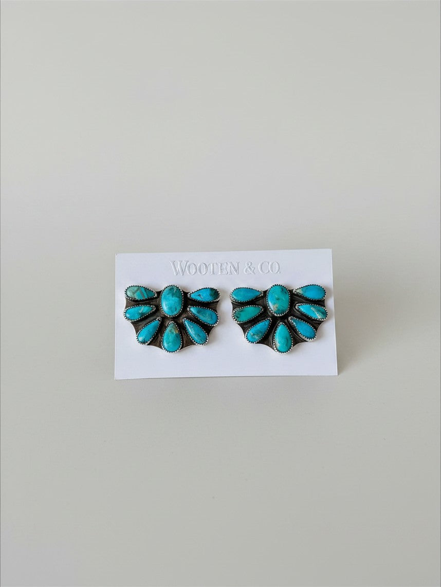 Wooten & Co. sterling silver cluster earrings featuring genuine turquoise stones in a Southwestern style design.