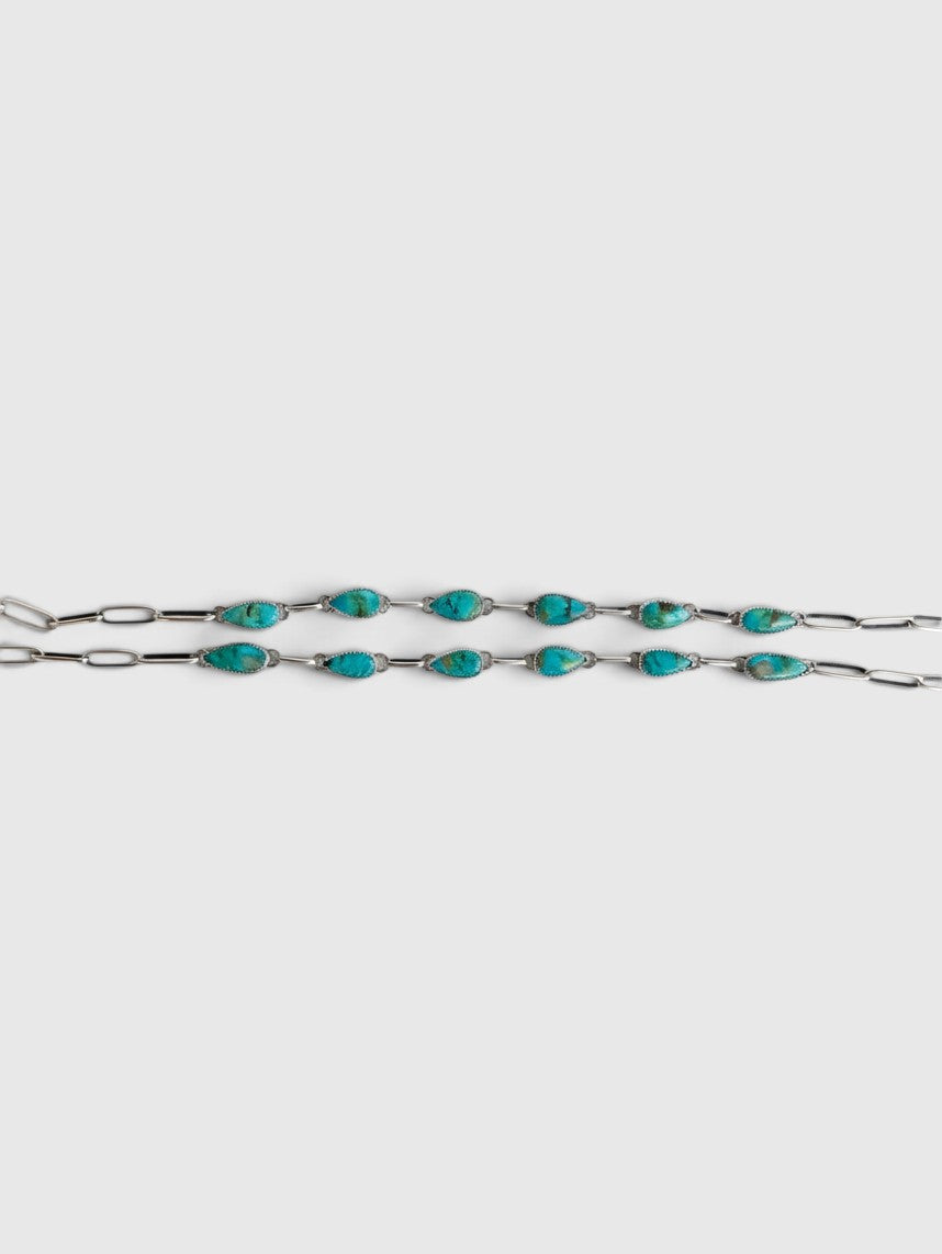 Wooten & Co. sterling silver necklace featuring six genuine turquoise teardrop stones in a Southwestern style.