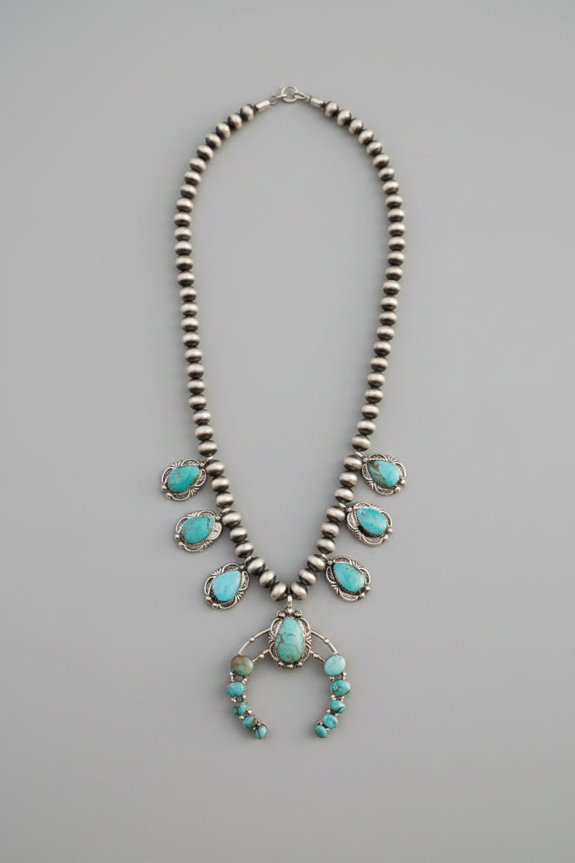 Two Stories Wide Turquoise Squash Blossom - Horseshoe J & Co.