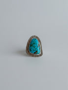 Wooten & Co. Palmer turquoise statement ring featuring a genuine stone in a textured sterling silver setting