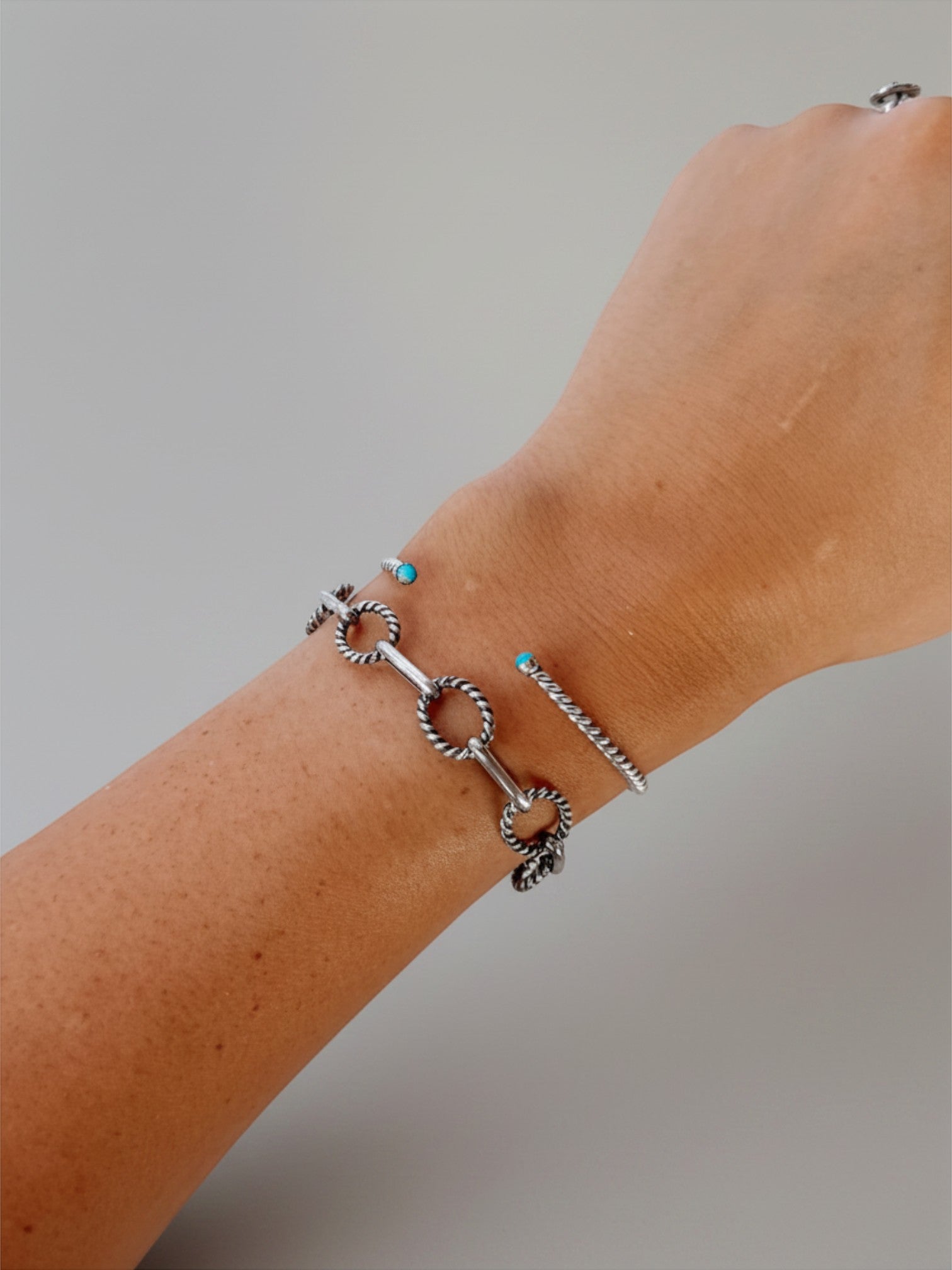 Wooten & Co. Ranchester sterling silver chain bracelet with alternating smooth and twisted links on a wrist