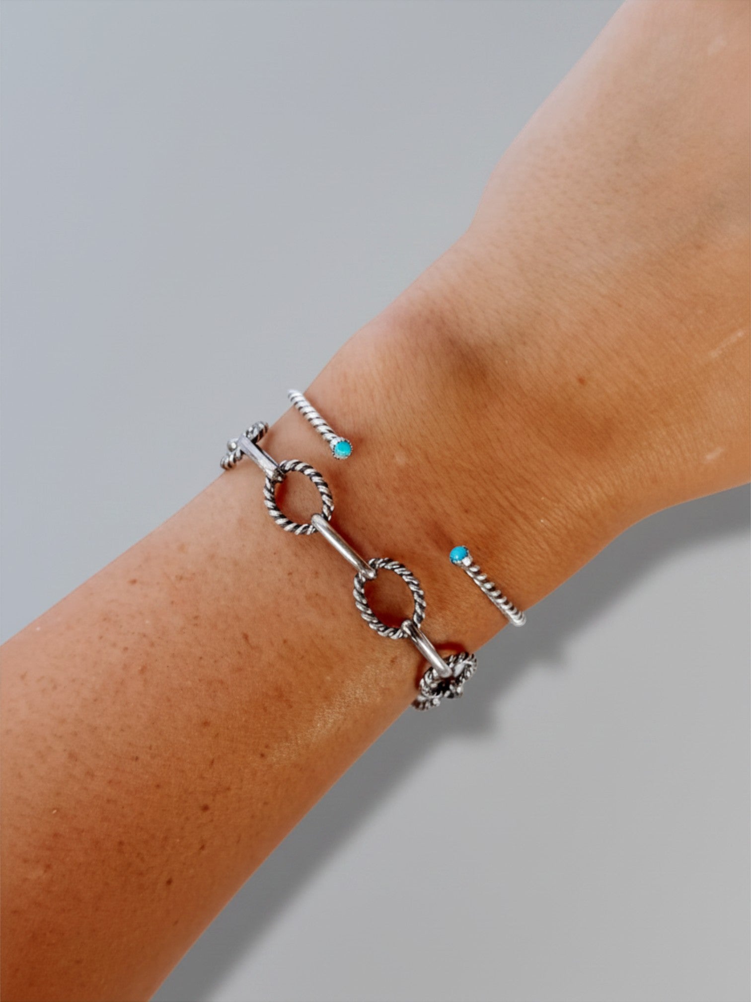 Wooten & Co. Ranchester sterling silver chain bracelet with alternating smooth and twisted links on a wrist