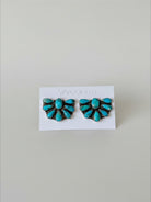 Wooten & Co. sterling silver cluster earrings featuring genuine turquoise stones in a Southwestern style design.
