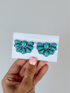 Wooten & Co. Avery turquoise cluster earrings featuring genuine stones set in sterling silver on a display card.