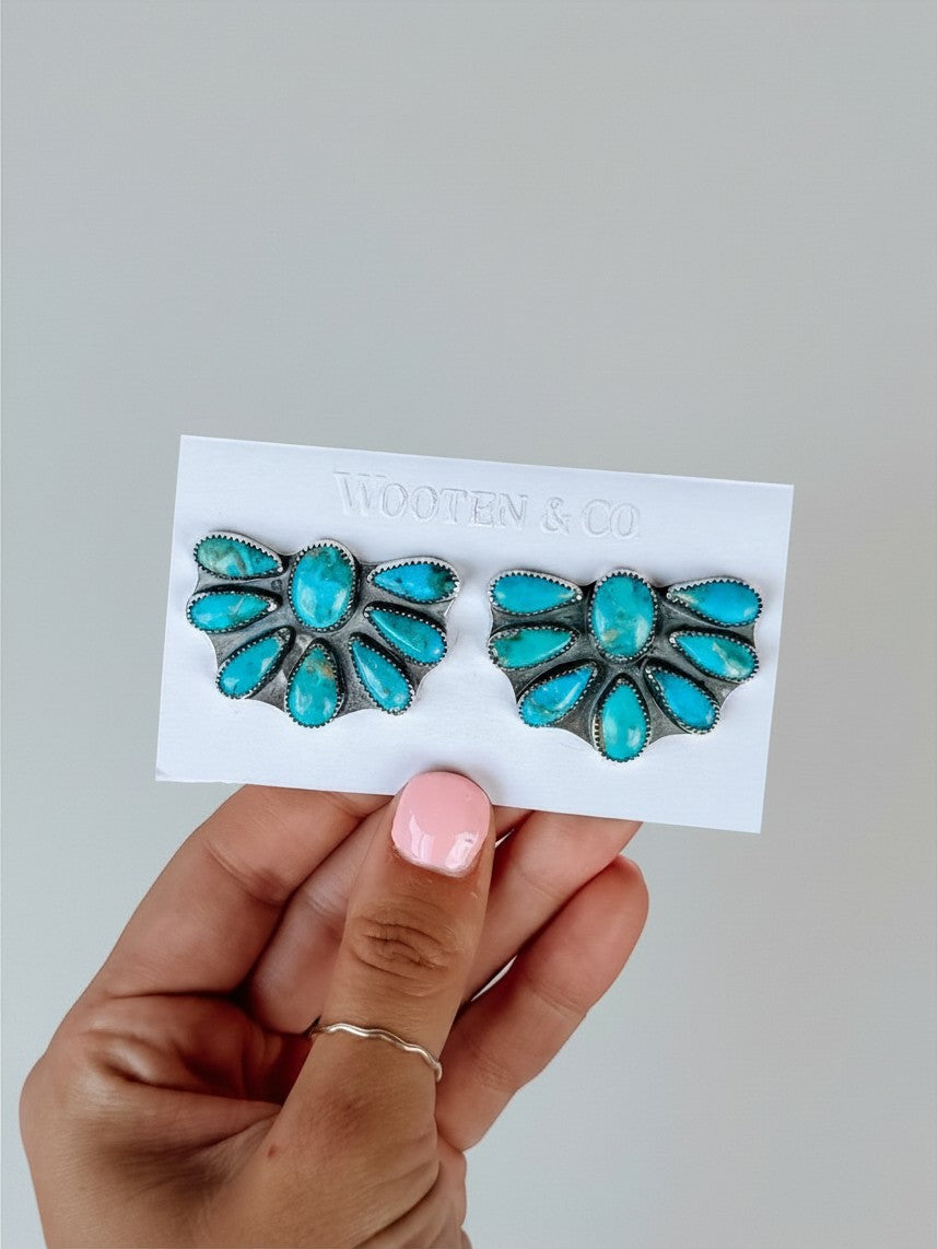 Wooten & Co. Avery turquoise cluster earrings featuring genuine stones set in sterling silver on a display card.