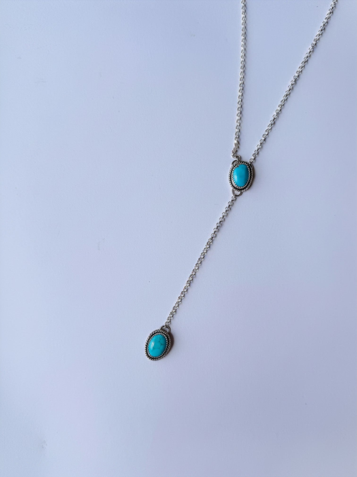 Wooten & Co. Paducah lariat necklace featuring two oval genuine turquoise stones set in sterling silver